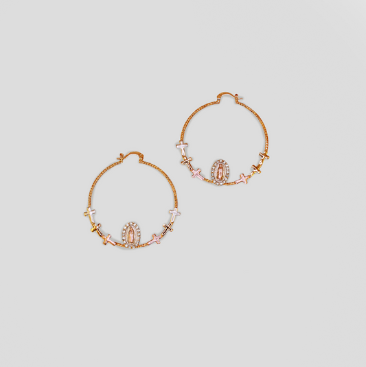 Gold-colored hoop earrings featuring a Virgin Mary medallion and small cross charms in various colors.