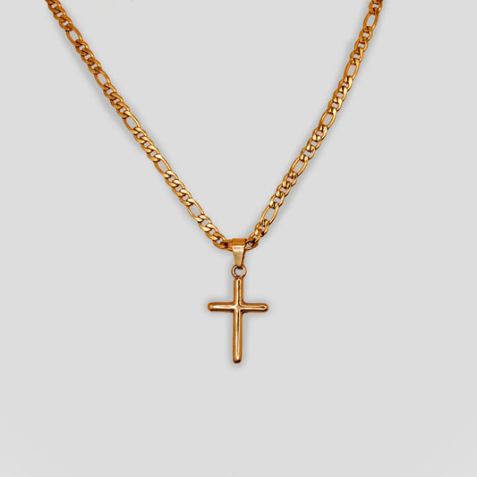 A gold color necklace with a figaro chain and simple elegant cross pendant.