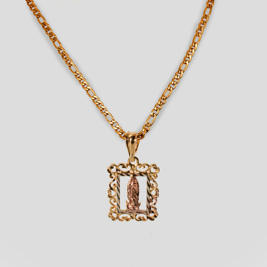 A necklace with a figaro chain and a pendant featuring a rectangle frame shape centered with the Virgin Mary.