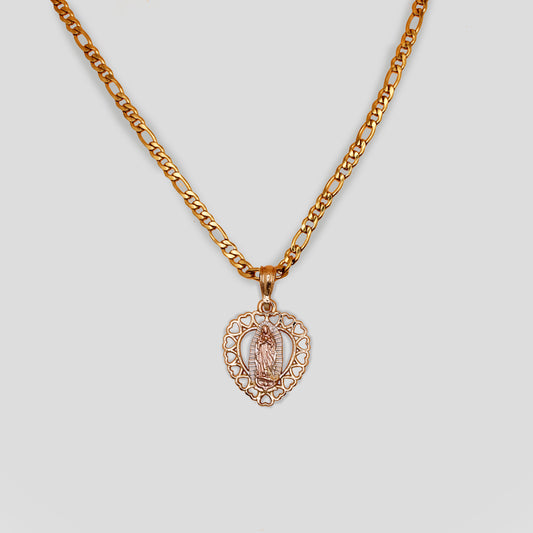 A necklace with a figaro chain and a Virgin Mary pendant. The pendant is surrounded with heart shapes around the Virgin Mary.