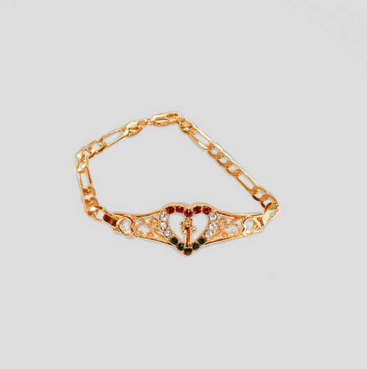 Gold-colored bracelet with a heart-shaped centerpiece, adorned with red, green, and clear simulant diamonds. Right in the center of the heart is the St. Benedict figure.