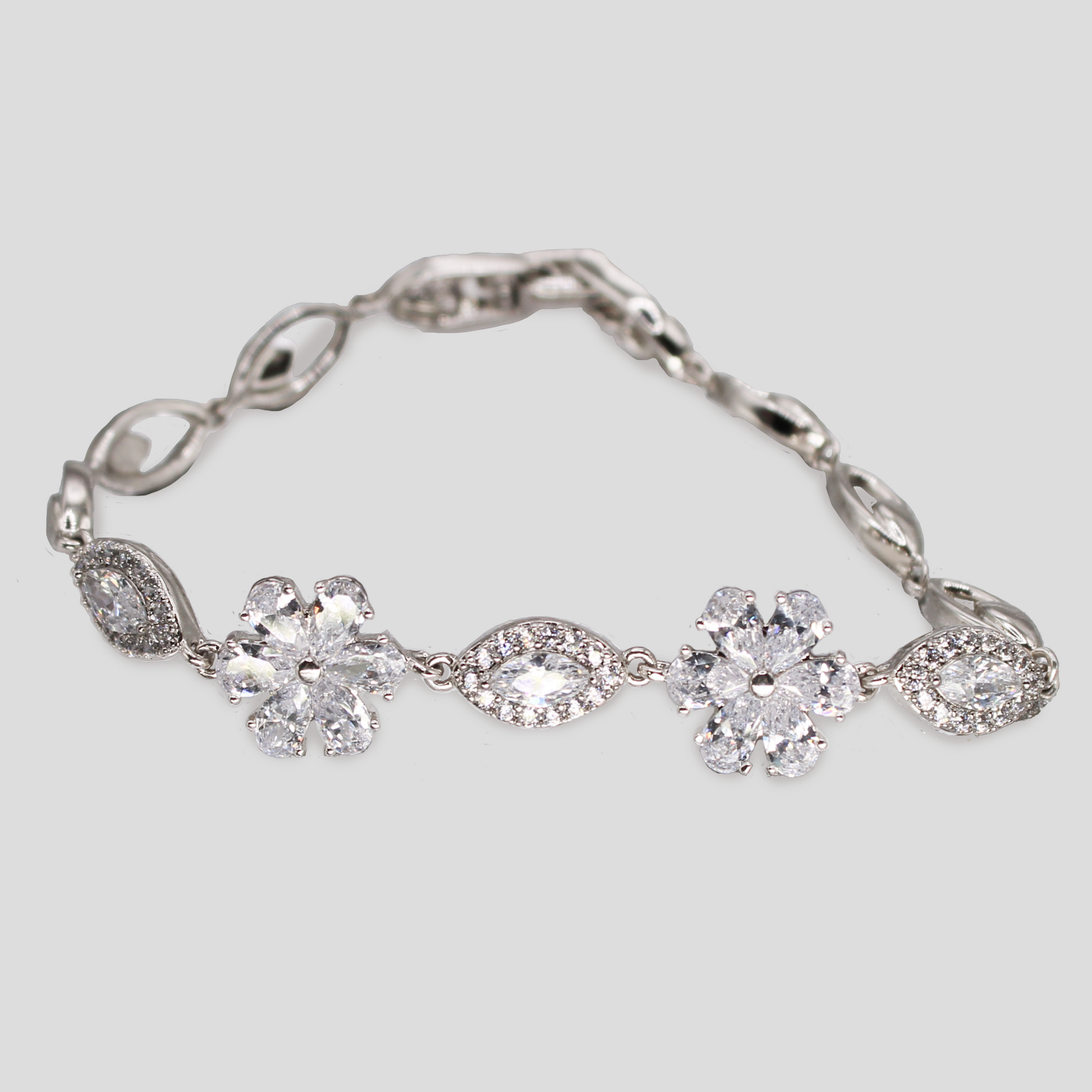 Silver-colored bracelet with flower-shaped and marquise-cut simulant diamonds.