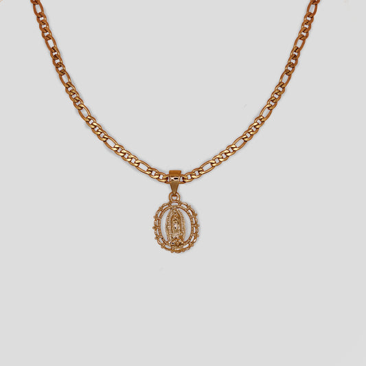 A figaro chain necklace with a oval shaped pendant with the Virgin Mary at the center.