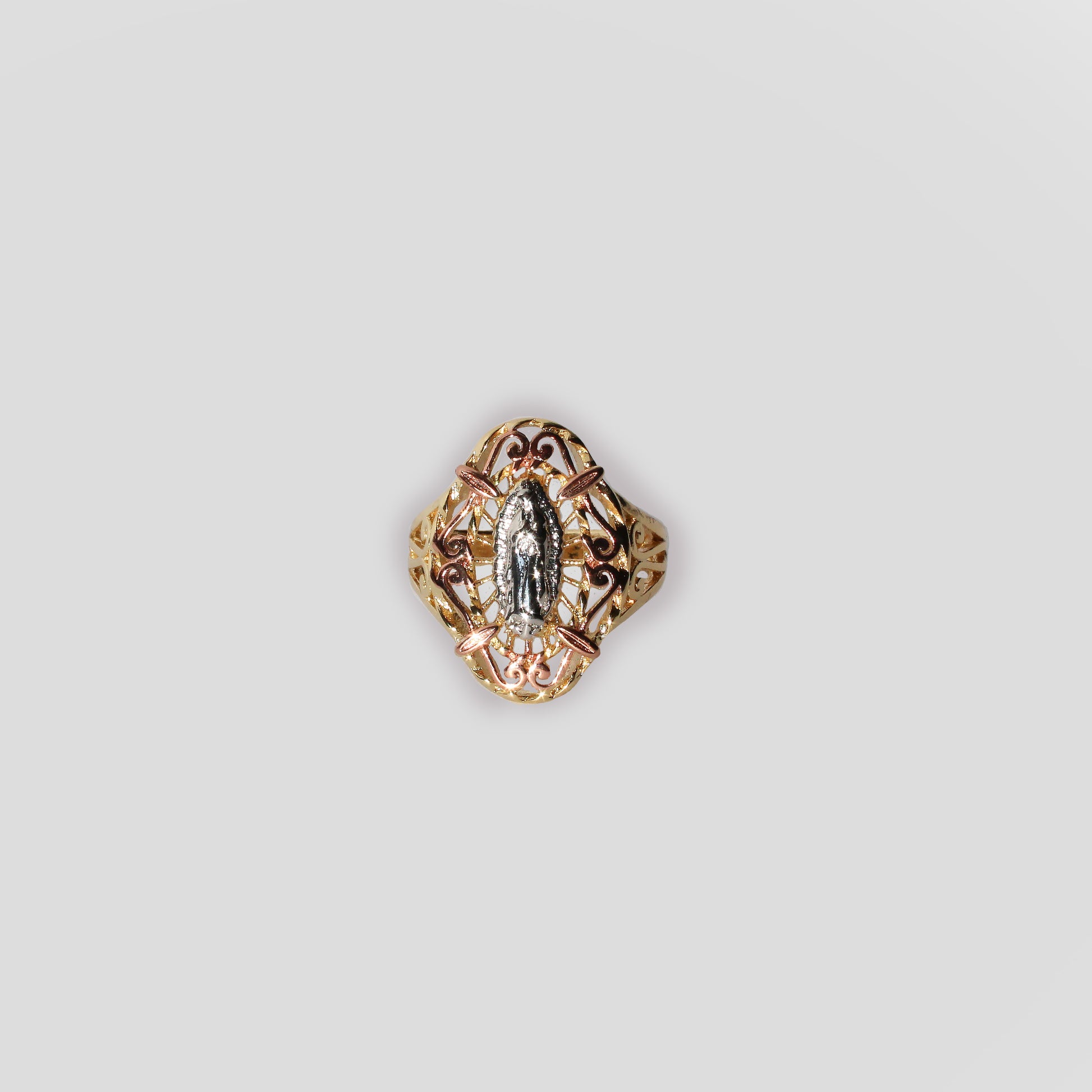 A ring featuring the Virgin Mary in the center.